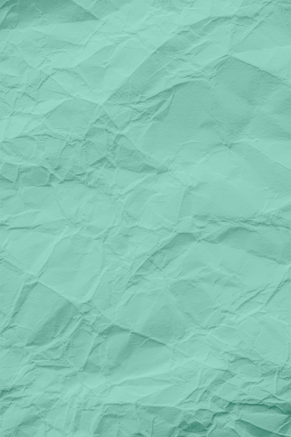 Crumpled turquoise paper texture background.